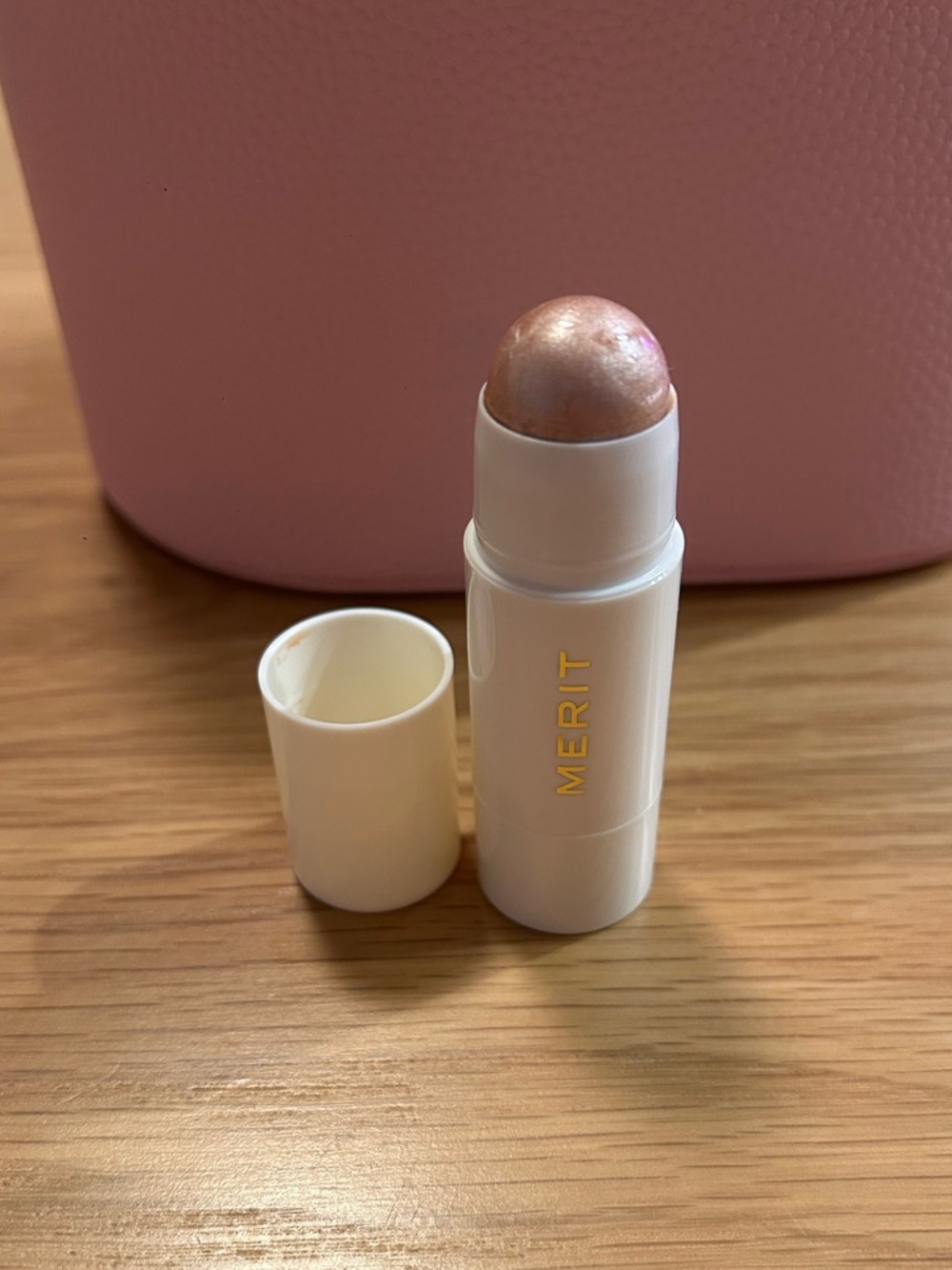 Merit Day Glow Dewy Highlighting Balm Color: Bounce - rose gold New